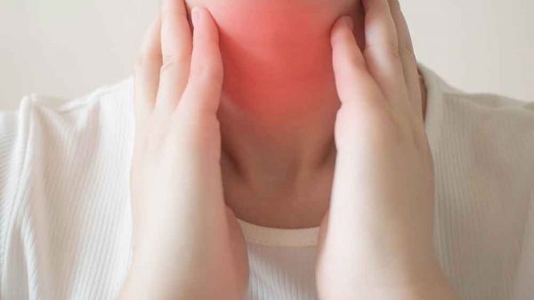 woman's neck with hypothyroidism