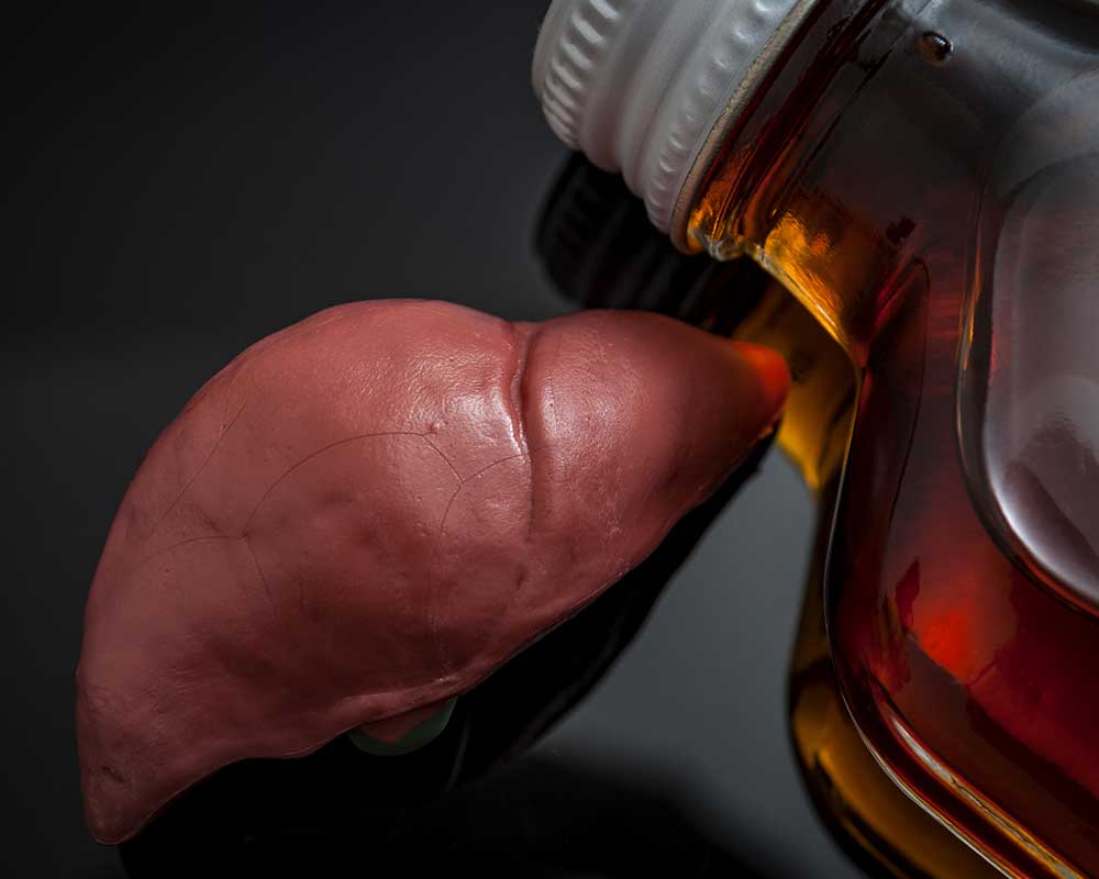 human liver and a bottle of rum