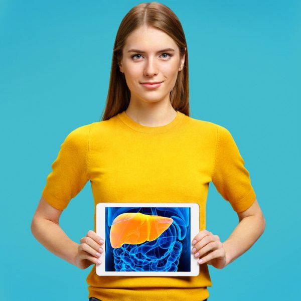woman holding a picture of human liver