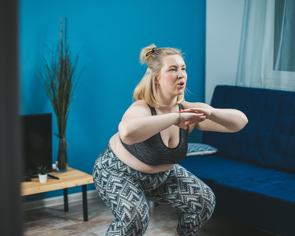 Fat woman exercising