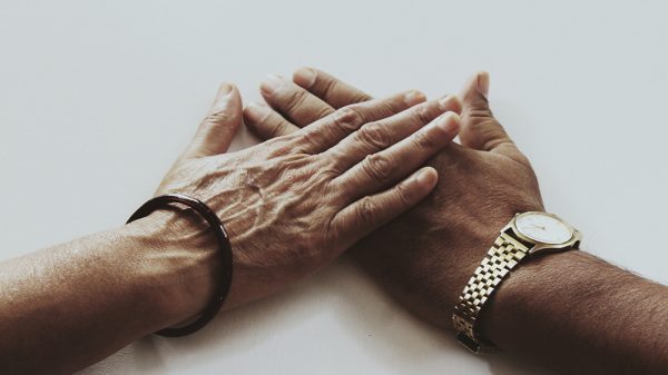 Senior Holding Hands