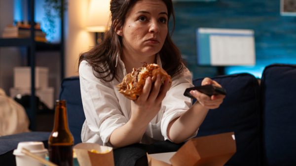 Woman binge eating